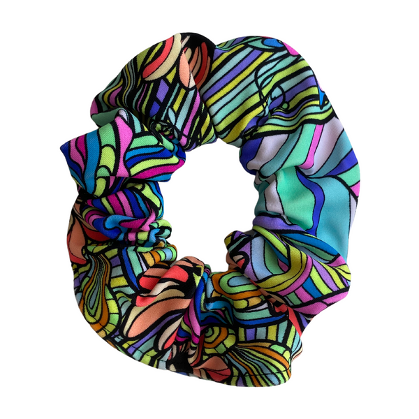 Close up picture of retro flower power swim scrunchie. Pipevine Designs.