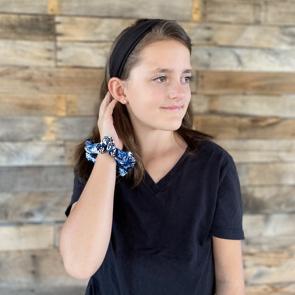 Winter Blues and white deco ice scrunchie on wrist