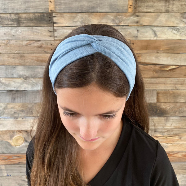 blue steel ribbed faux knot headband ear warmer on head top knot view Pipevine Designs