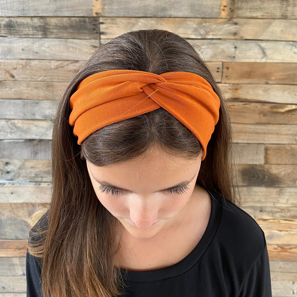 ginger rust matte faux knot headband on head top view Pipevine designs 