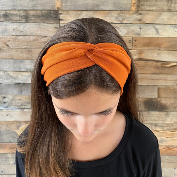 ginger rust matte faux knot headband on head top view Pipevine designs