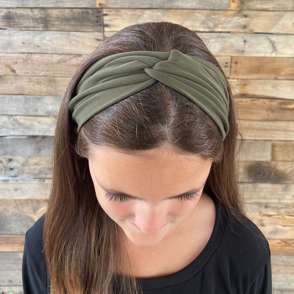 olive green matte faux knot headband on head top knot view Pipevine Designs
