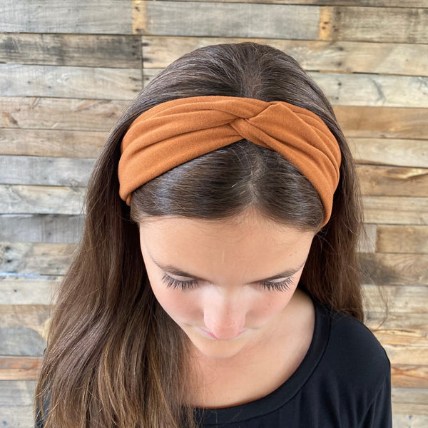 tawny brown matte faux knot headband on head top knot view Pipevine Designs