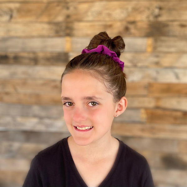 magenta ice scrunchie on hair bun Pipevine Designs