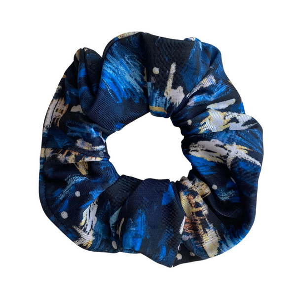 Close up picture of abstract navy blue scrunchie. Pipevine Designs.
