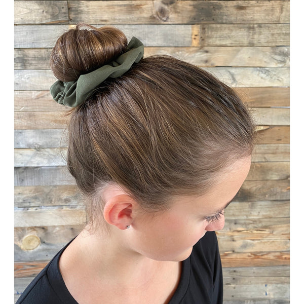 Olive Green matte scrunchie on head Pipevine Designs