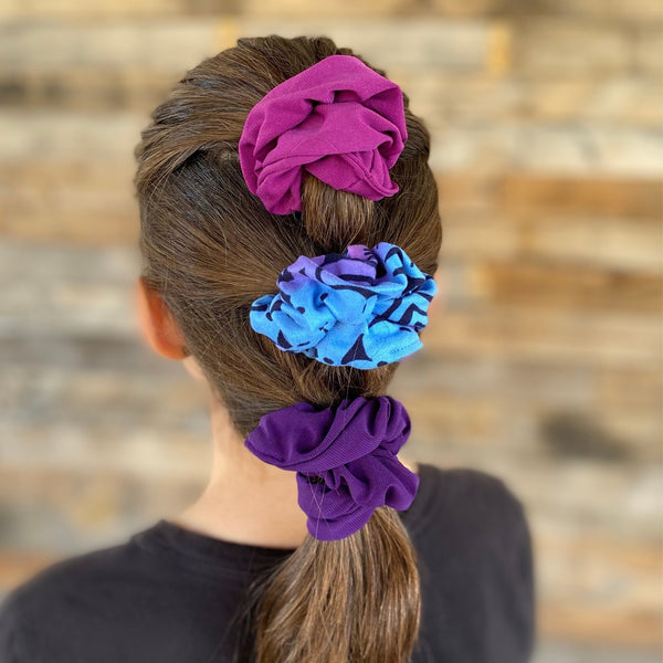 magenta ice scrunchie, aurora ombre scrunchie, and dark purple ice scrunchie in hair. Pipevine Designs 